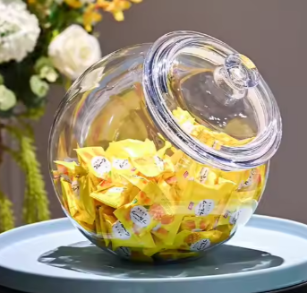 clear glass jar with candy