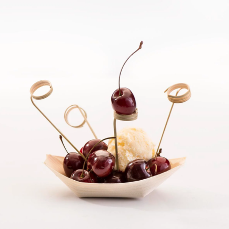 cherries and ice cream with bamboo skewers